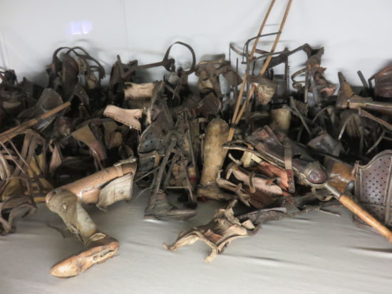 Piles of artificial limbs. My Visit to Auschwitz-Birkenau Memorial and Museum