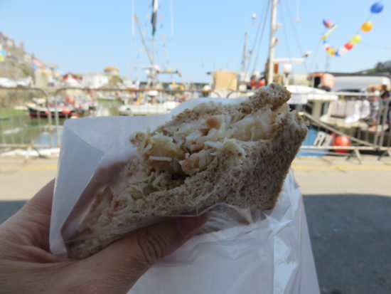 Crab sandwich at Mevagissey harbour. Self-Drive Itinerary Around the Coast of Cornwall England