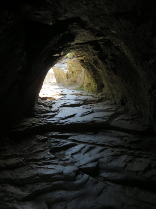 Tunnel at Tintagel Castle. Guide to Visiting Tintagel Castle - The Legend of King Arthur