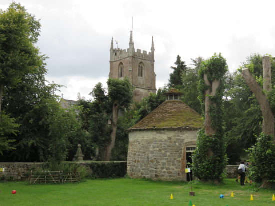 St James Church and Dovecote. Visiting the historic village of Avebury and its henge and stone circles, England