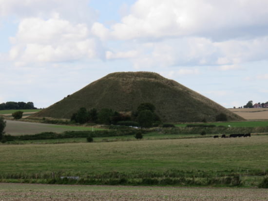 Silbury Hill. Visiting the historic village of Avebury and its henge and stone circles, England