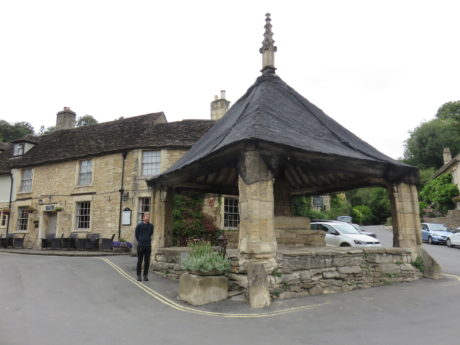 14th century market cross. Exploring Castle Combe, the prettiest village in the Cotswolds, Wiltshire #England