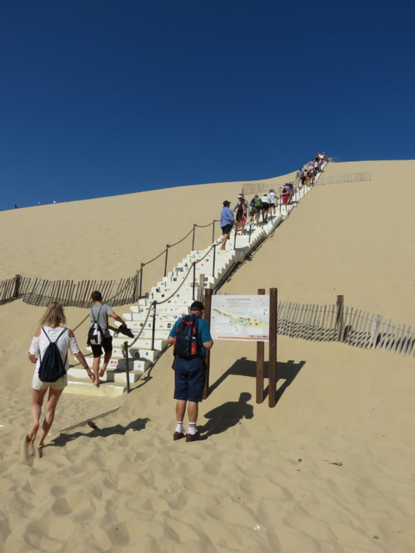 Stairway up to the top of Dune du Pilat. What to see and do in Arcachon France #france #francetravel #arcachon