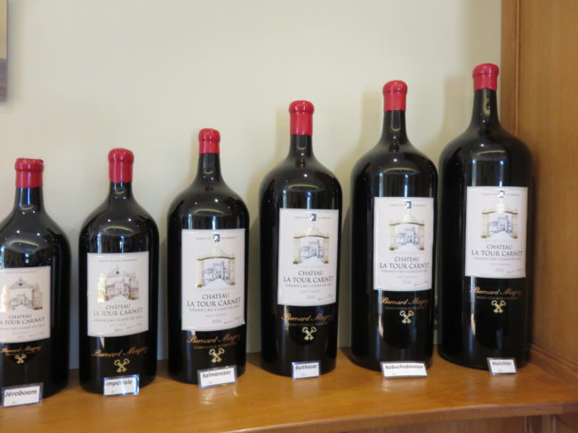 Bottles of wine at Château La Tour Carnet. Wine tour of the Medoc region Bordeaux #france #francetravel #winetour