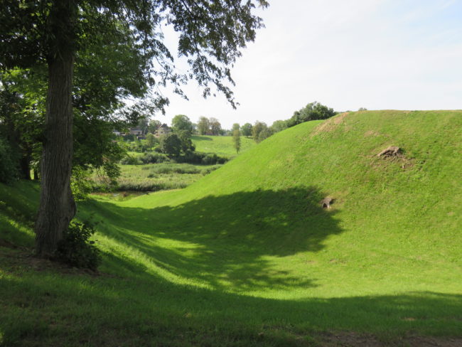 Deep ditch protecting Bauska Castle.A Guide to Visiting Bauska Castle and Rundale Palace in #latvia
