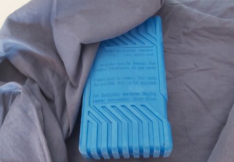 Ice packs wrapped in a tea towel